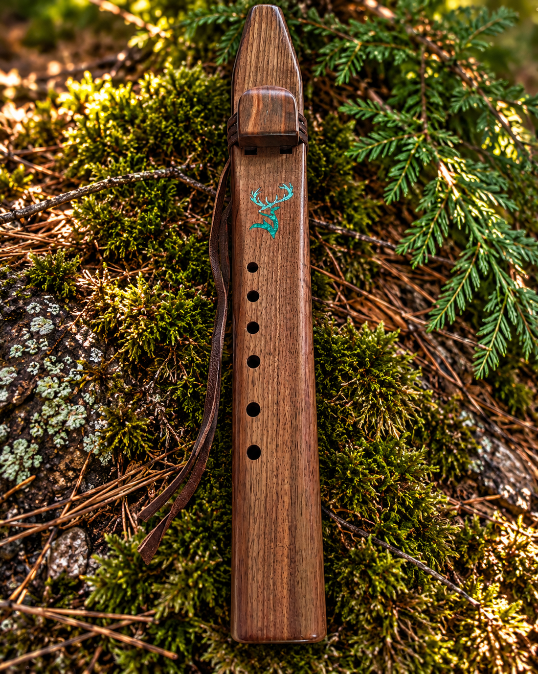 Full black walnut stag drone flute in forest