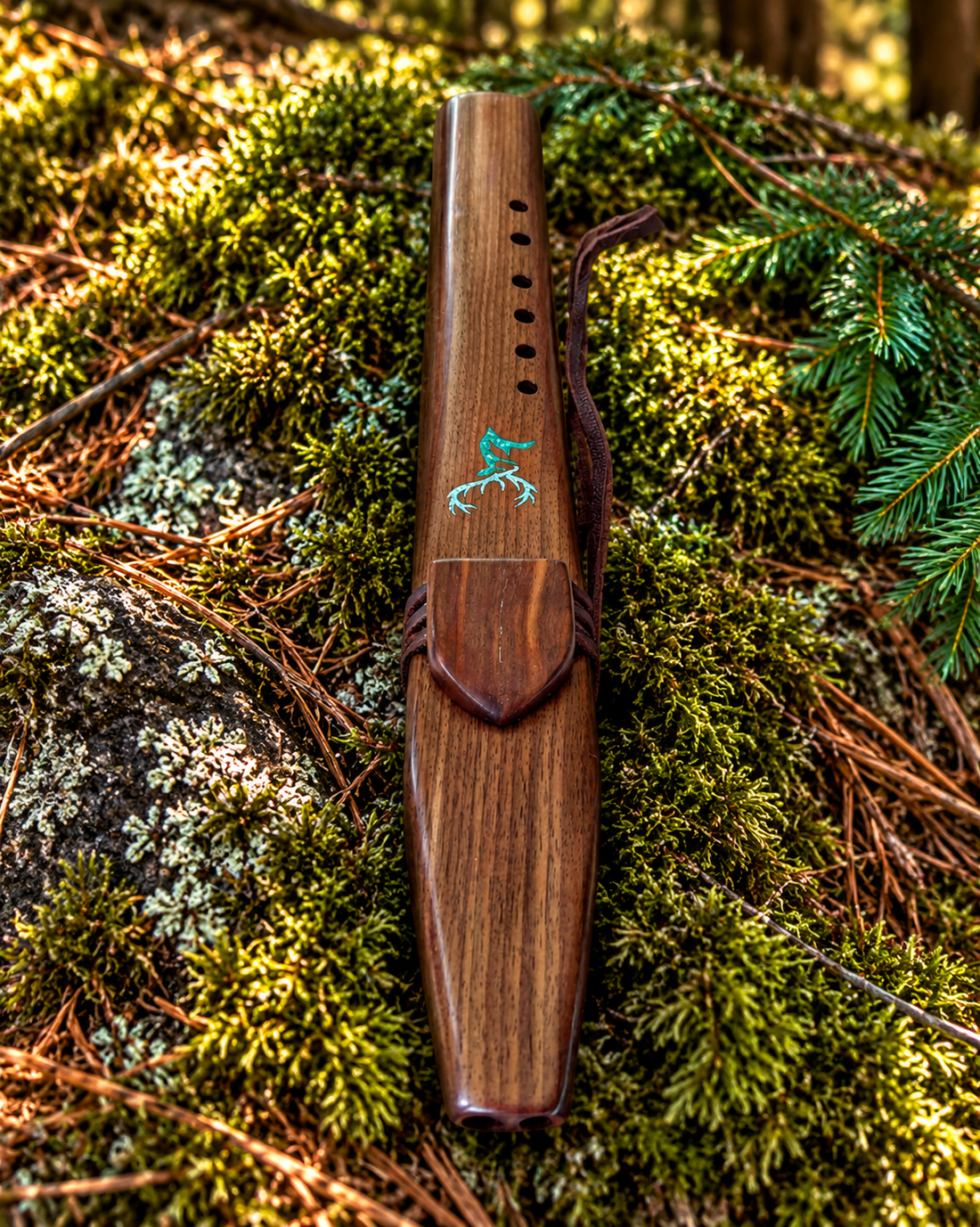 Reverse view of black walnut stag drone flute